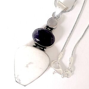2 inch Howlite and Amethyst pendant on 20 inch silver chain.